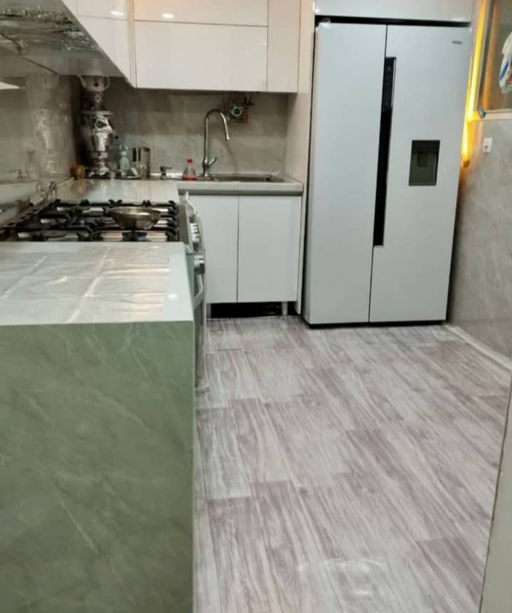 قیمت کفپوش رولی موکتی 2 در 15 متر پی وی سی طرح پارکت طوسی