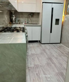 قیمت کفپوش رولی موکتی 2 در 15 متر پی وی سی طرح پارکت طوسی